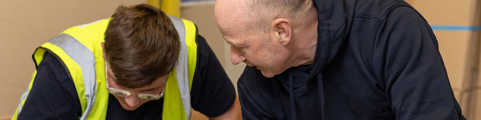 Staff member working with new starter